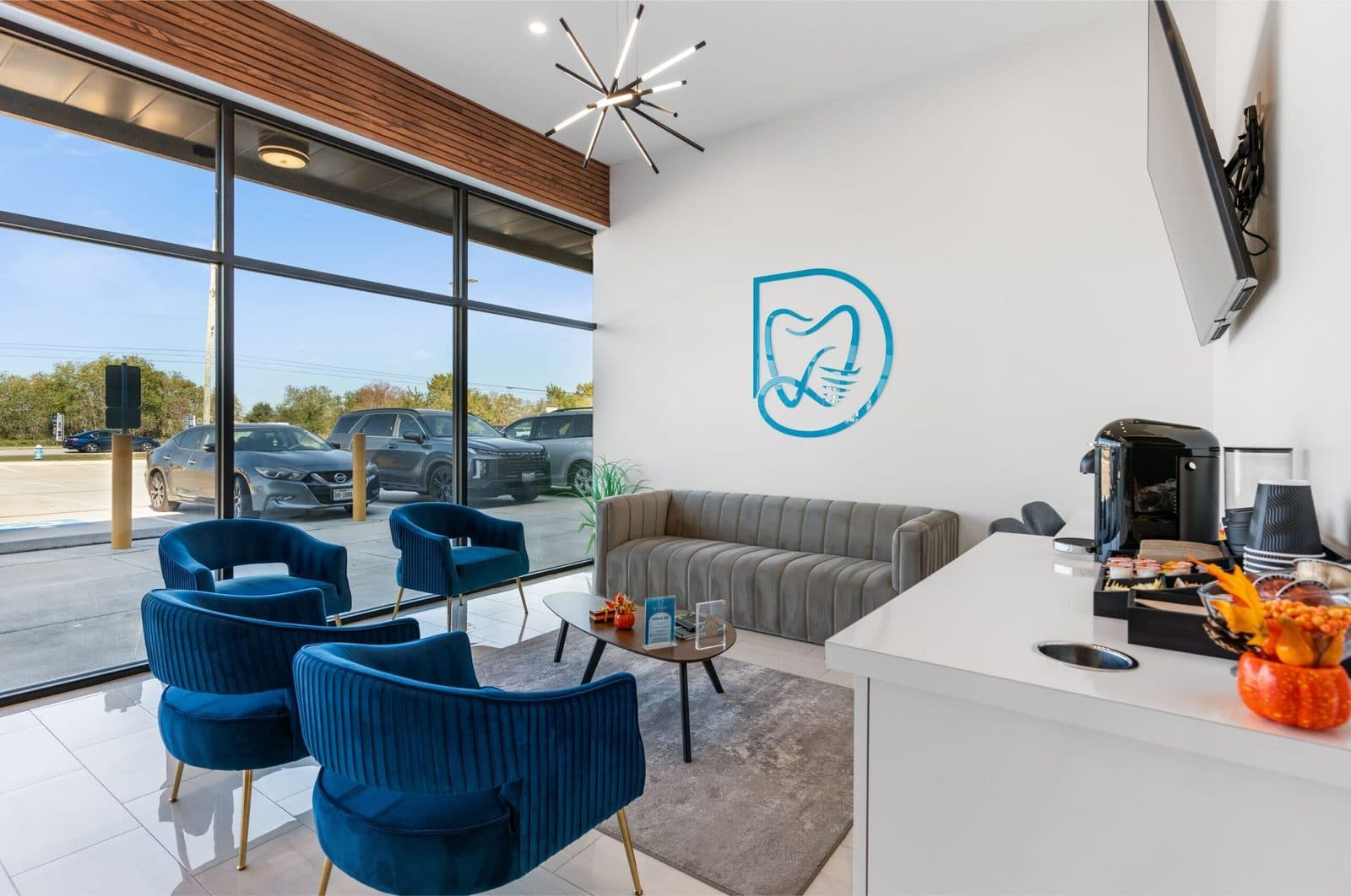 The bright, modern waiting area at Dentality Family Dentistry in Katy, TX